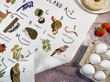 Load image into Gallery viewer, Woodland A-Z Tea Towel
